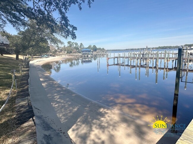 Building Photo - 3 Bedroom Townhome with Community Pools, Dock & Beach Access in Hidden Bay Village!