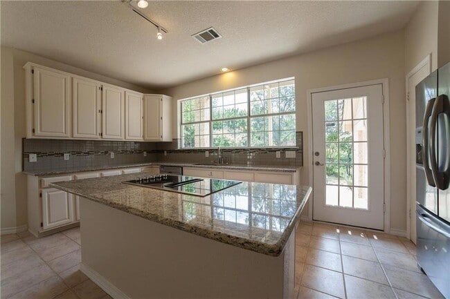 Building Photo - 1701 Idle Hour Cove