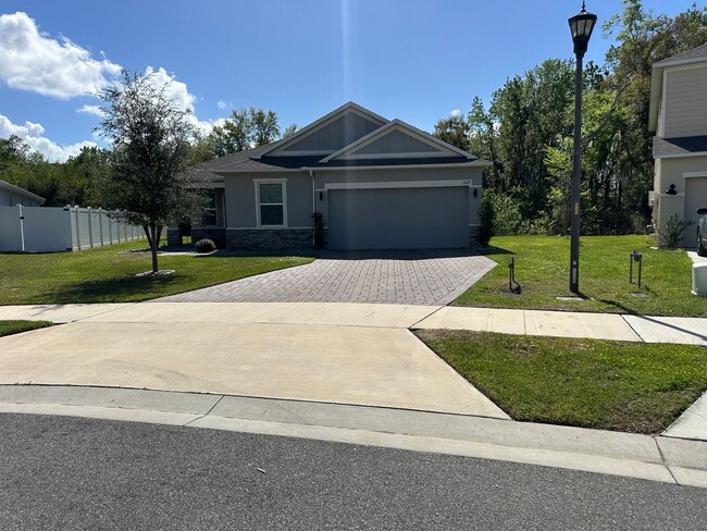 Building Photo - Nearly New 3 Bedroom Smart Home with Lawn Care Included!