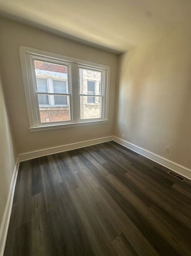 Building Photo - BRAND NEW 2 BEDROOM 1 BATH FIRST FLOOR APARTMENT