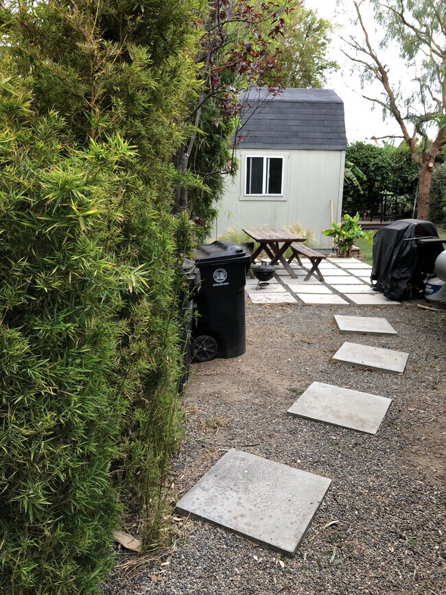 Back yard path from NW side - 8643 Higuera St