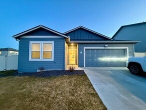 Building Photo - New Construction 4 Bed Mead School District Rancher w/ Fully-Fenced Yard and Attached Garage!
