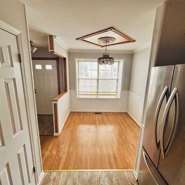 Building Photo - Spacious 3-Bedroom, 3-Bathroom Townhome with Finished Basement, Garage & Fenced Yard