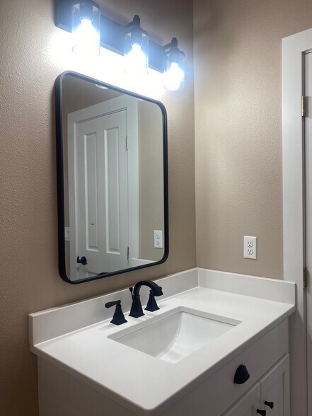 Bathroom vanity - 307 E Main St