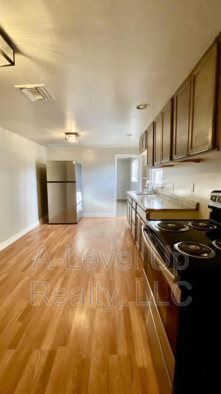 Building Photo - 3909 S 14th Ave