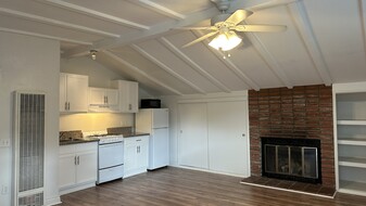 Large Studio unit with vaulted ceiling and wood burning fireplace. - 15416 Wyandotte St