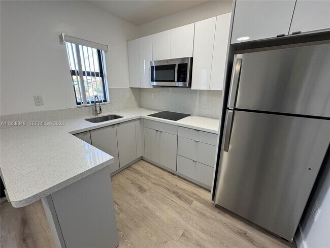 Building Photo - 1971 NW 2nd Ct