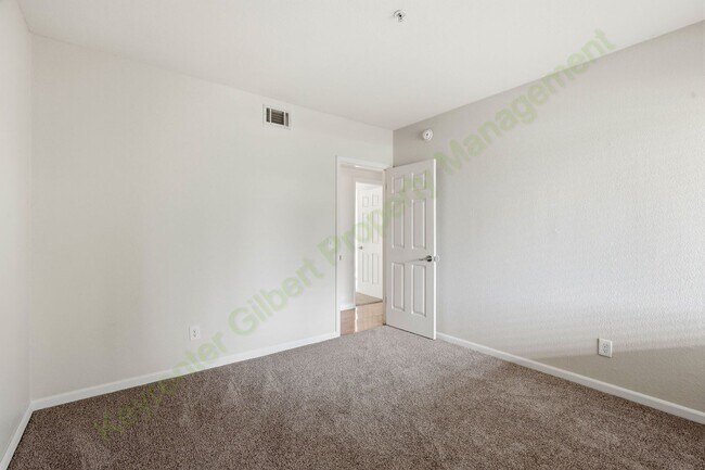 Building Photo - Freshly Updated 2-Bedroom Condo in Gated Lakeshore at Andersen Springs – New Paint & New Carpet!