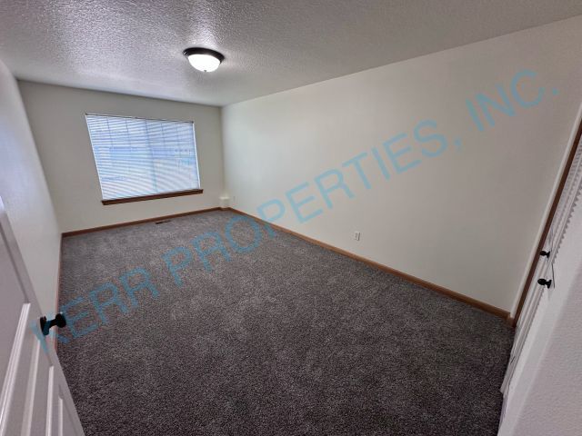 Building Photo - FREE RENT! Beautiful 1900 square foot 3 be...