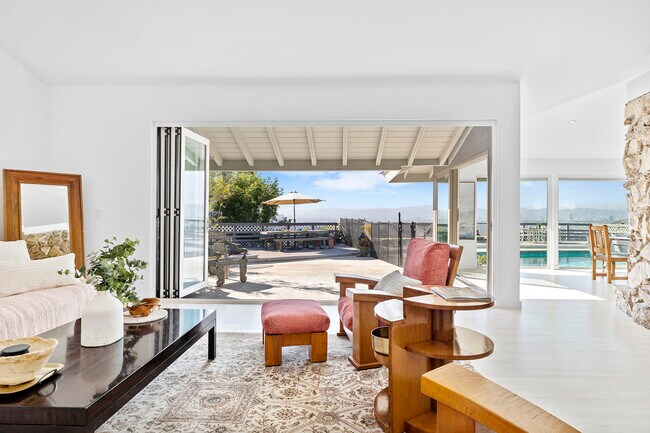 Inside / Outside Living Room - 4557 Don Milagro Dr