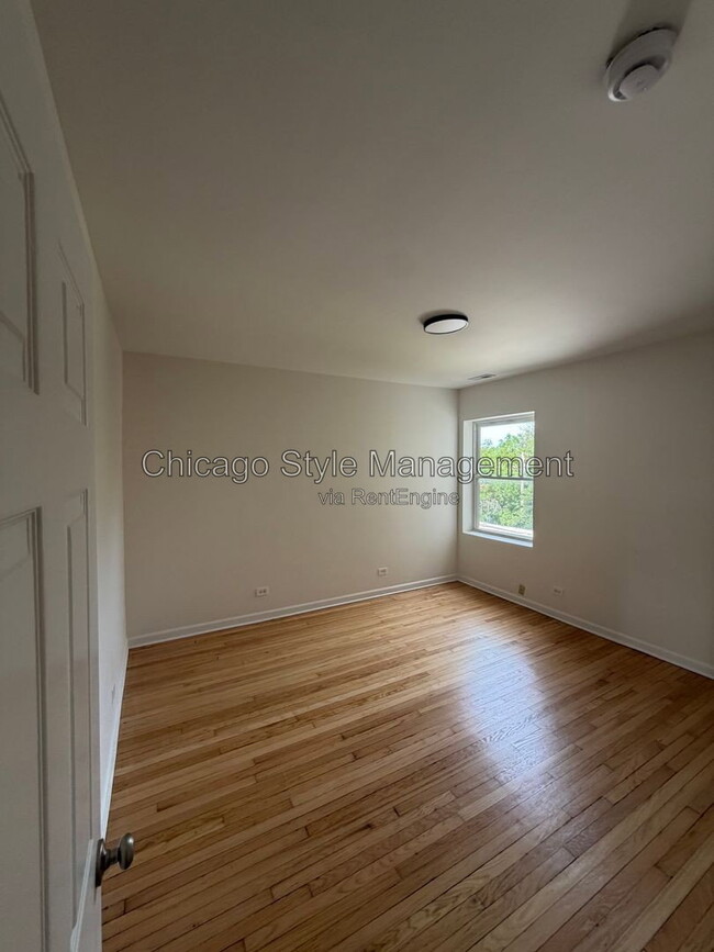 Building Photo - 7833 S Colfax Ave