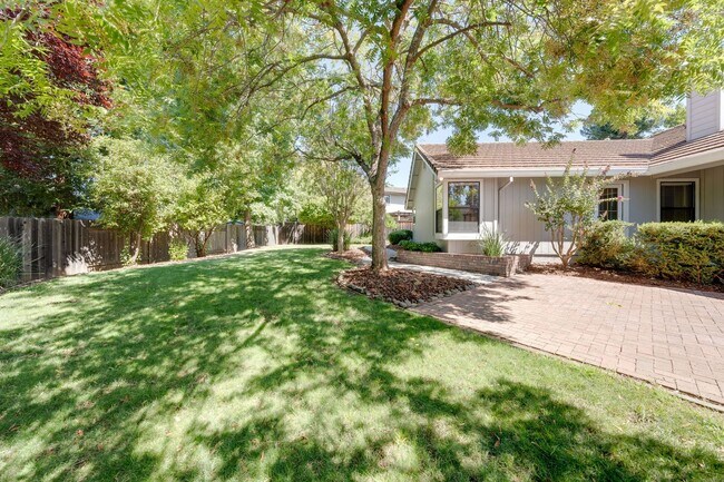 Building Photo - Bright and Stylish 4BD/2BA Home with 3 Car...