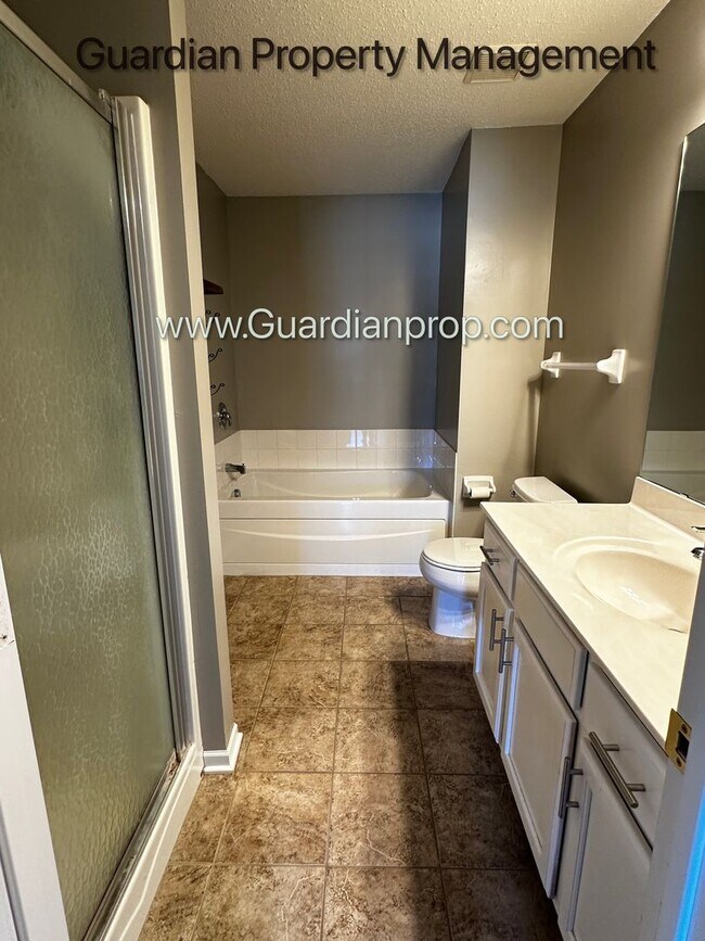 Building Photo - Maple Grove 2 Bedroom Town Home, 2 Car Garage, Patio, Dishwasher, W/D