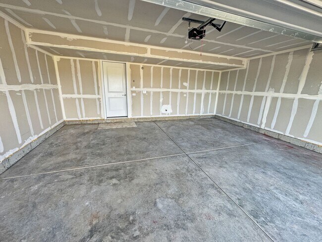 Building Photo - Step into modern living with this brand-ne...