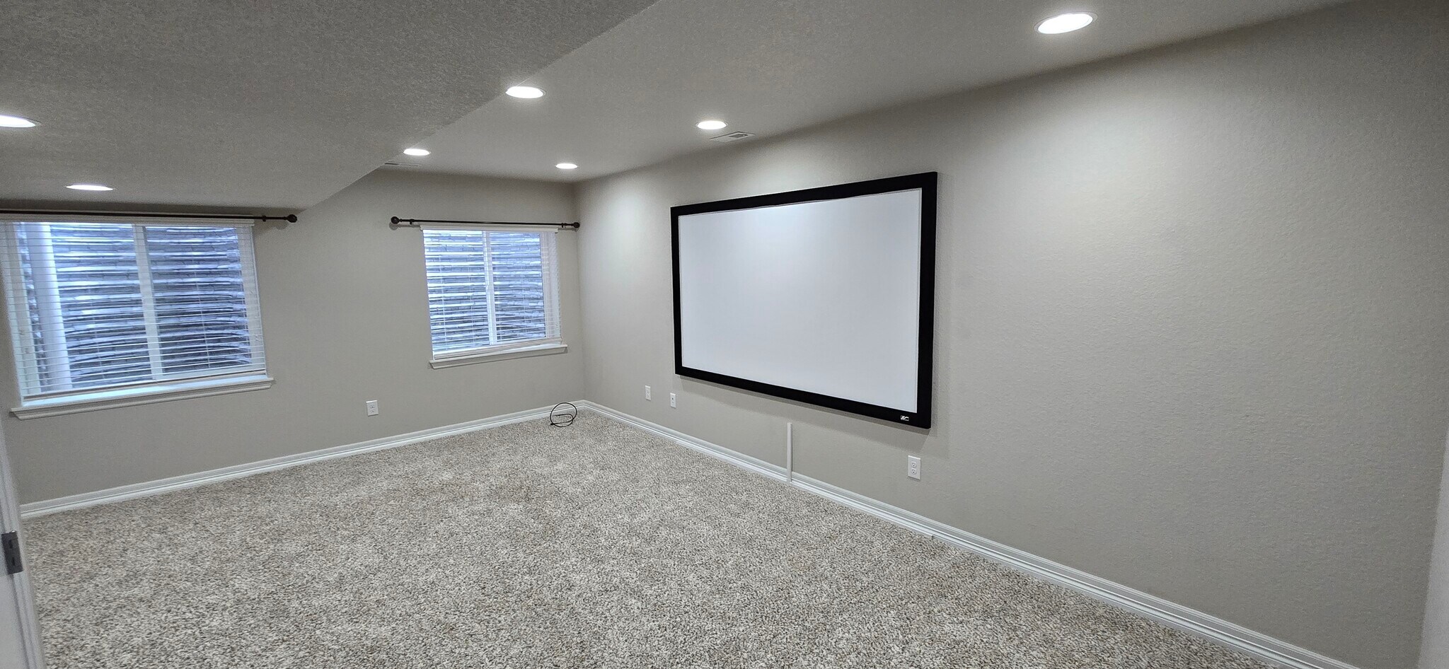 Basement living room with projector - 6081 Anders Ridge Ln