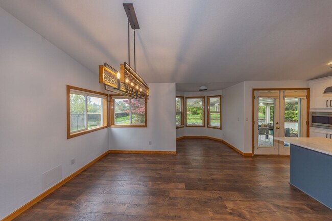 Building Photo - One Level Home - Three Bedroom + Bonus with AC / Beautiful Yard!