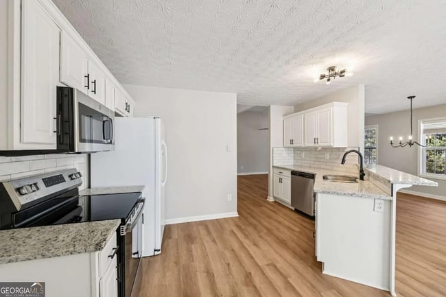 Building Photo - 7091 Greenridge Dr