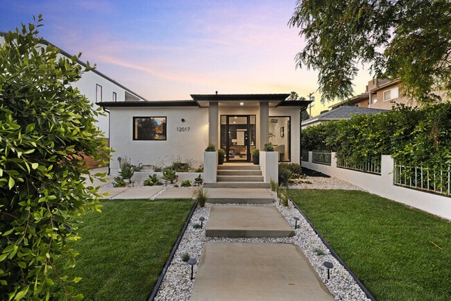 Building Photo - Brand-New Designer Home — 2 Bed + 2 Bath + Office | Gated Yard & Private Driveway Parking
