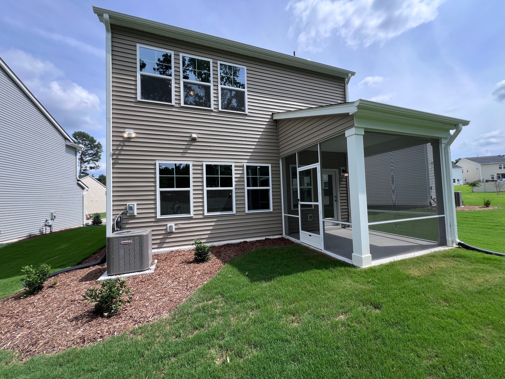 Backside of the house -- with a screened-in porch! - 2207 Cape May Ln