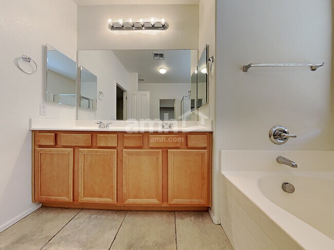 Building Photo - 15954 W Port Royale Ln