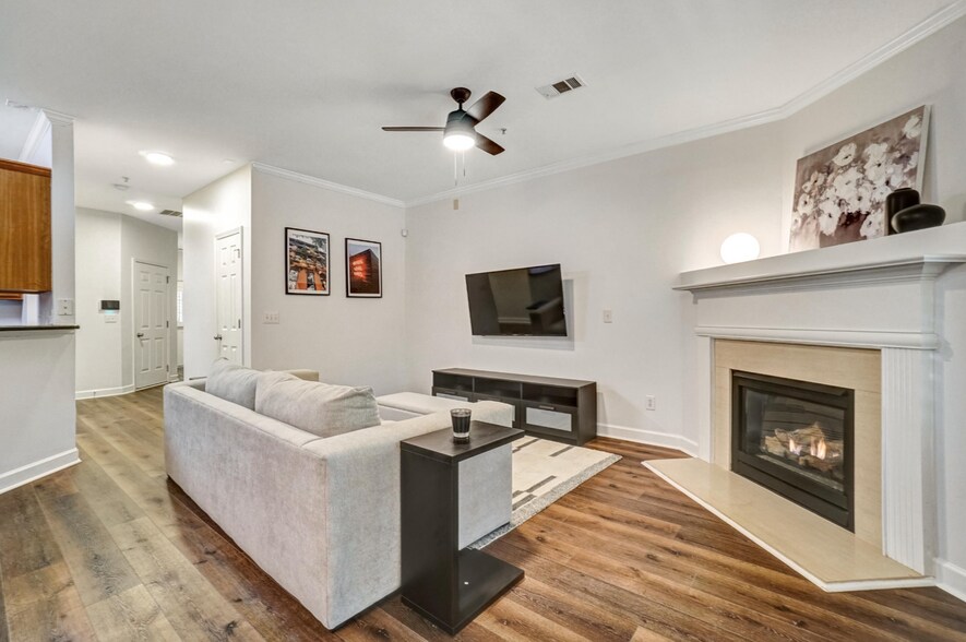 Living Room with Fireplace - 702 Surrey Park Pl SE