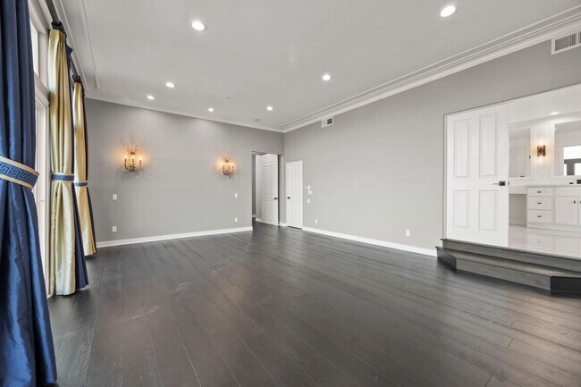 Building Photo - Modern Elegance Meets Scenic Privacy in Be...