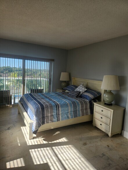 Bedroom with Balcony - 6000 N Ocean Blvd