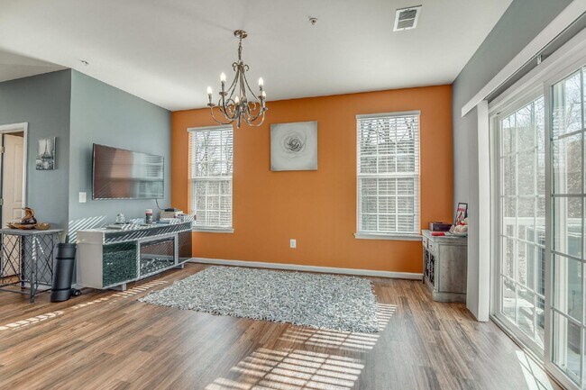 Building Photo - 3-bedroom, 2.5-bathroom condo with a great open-concept main level.