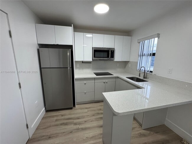 Building Photo - 1971 NW 2nd Ct