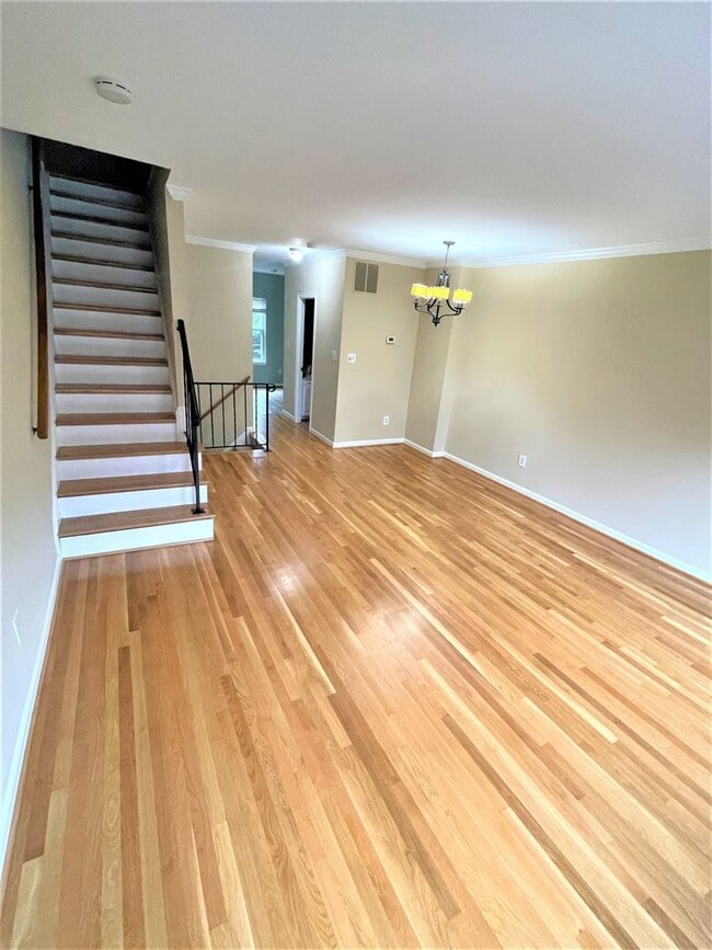 Building Photo - Updated, all brick 3 level townhouse pet friendly townhouse for rent!