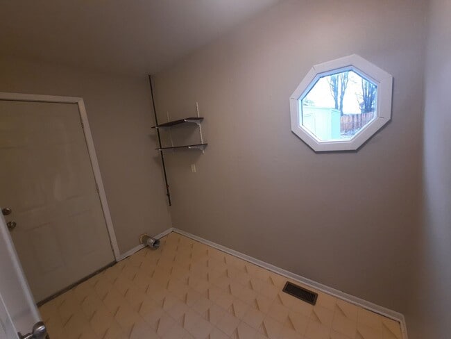 Building Photo - Two Bedroom, One Bathroom Home with fenced yard and shed