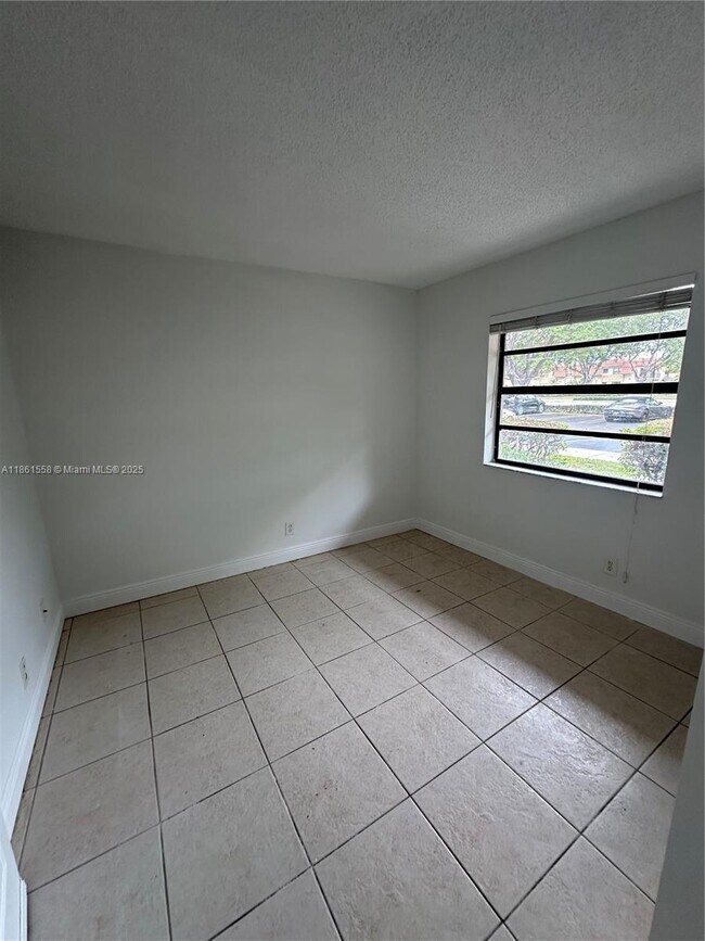 Building Photo - 11213 Royal Palm Blvd