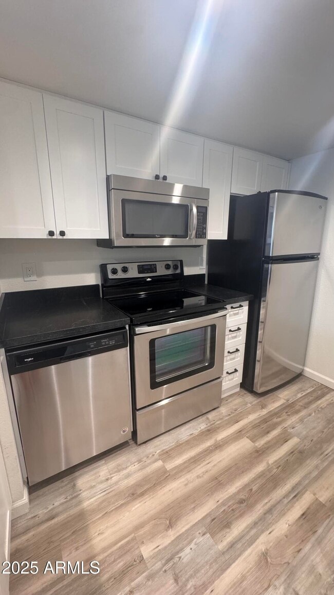 Building Photo - 4850 E Desert Cove Ave