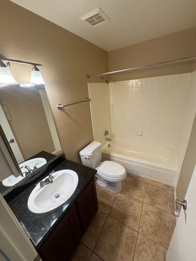 Building Photo - 2 Bedroom - 2 Bath 920 Sq. Ft. Condo in Be...