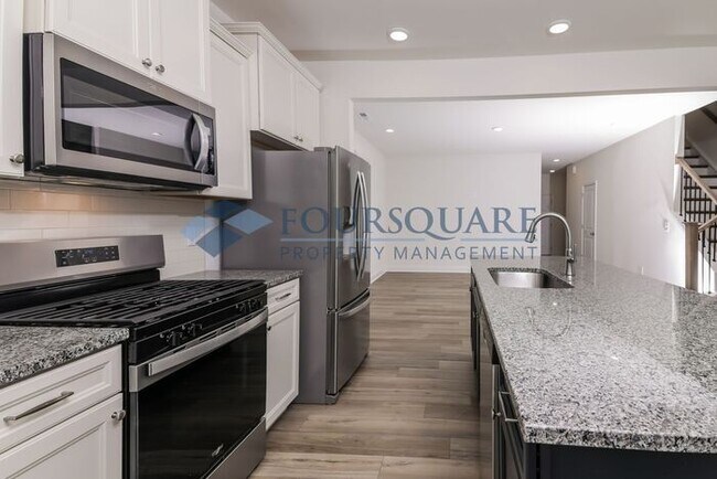 Building Photo - End Unit Townhome | Back Patio with Privac...