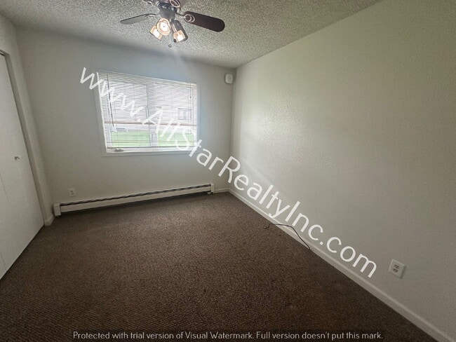 Building Photo - 8110 E 16th Ave