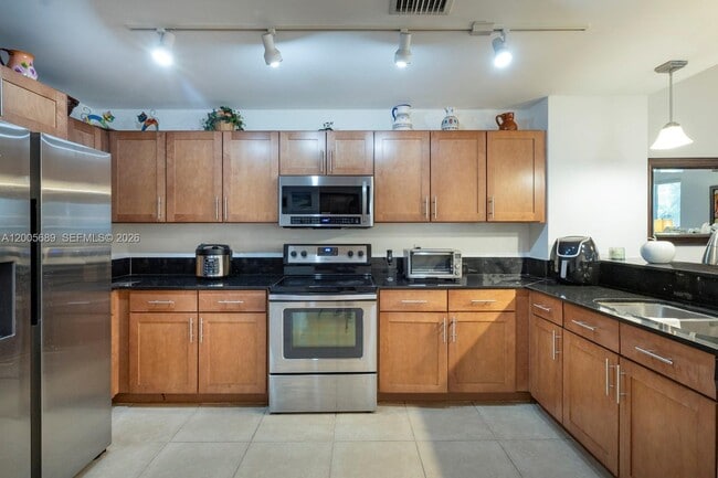 Building Photo - 8390 SW 72nd Ave