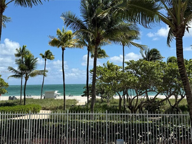 Building Photo - 10275 Collins Ave