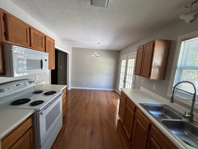 Building Photo - Greensboro Home - Lisa Barker - (734) 231-...