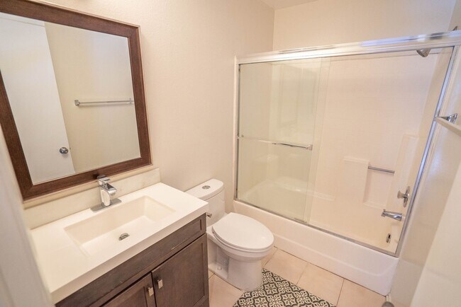 Building Photo - 2-Bedroom Condo with some Utilities Includ...
