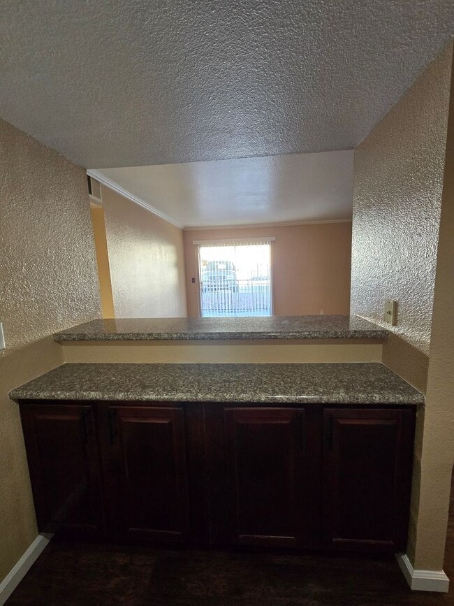 Building Photo - Beautiful 2-Bedroom First-Floor Condo in a Guard-Gated Community