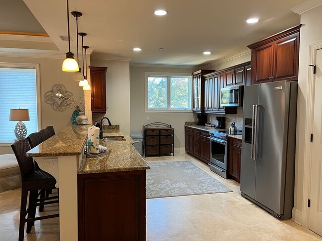 Building Photo - Walk to the Beach from this Furnished and Renovated Condo!