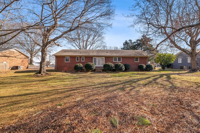Building Photo - Elon - Large Brick Home, Hardwoods, Granite Counter-Tops, SS Appliances, Fire Place, Carport - Mu...