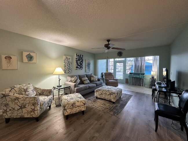 Building Photo - "Charming 2-Bed, 2-Bath Furnished Condo wi...