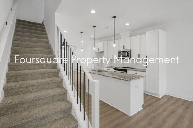 Building Photo - Modern 4-Bed / 3.5-Bath Townhome with Main Level Hard-Surface Floors , Back Patio – Easy Access t...