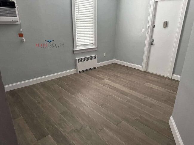 Building Photo - 21-44-44 71st St