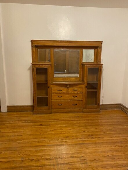living/ dinning room with china cabinet - 5704 S Kimbark Ave