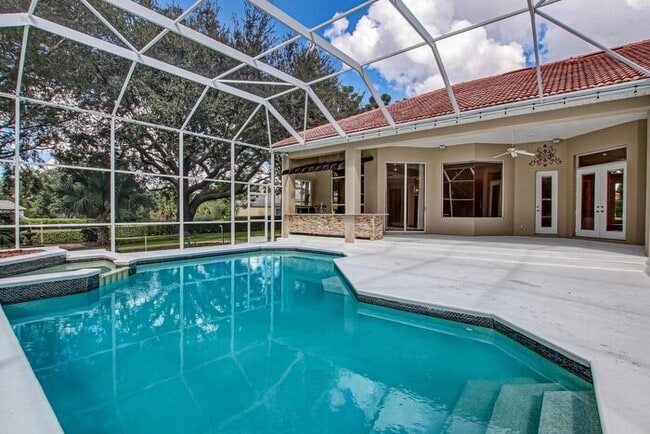 Building Photo - Stunning 5-Bedroom Pool Home on Nearly 2 A...