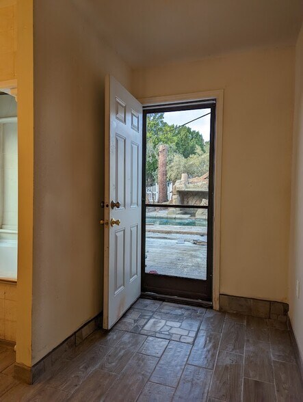 Entrance, unit is facing the pool - 13690 Westward Dr