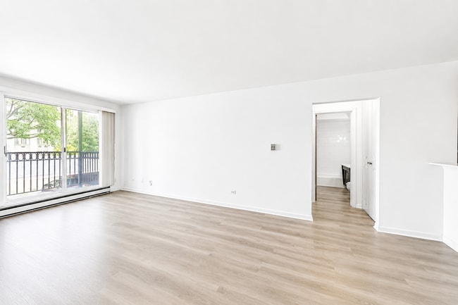 Building Photo - Spacious Rehabbed 1-Bedroom at The Vine | Private Balcony + Parking